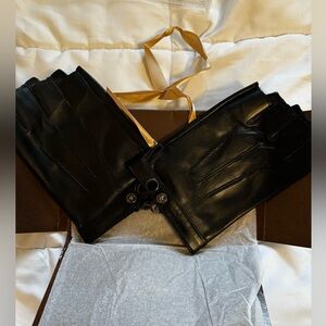 Black cosplay fingerless gloves. Brand new in package. Never worn.